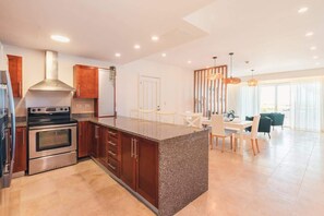 Fridge, microwave, oven, stovetop - Ocean View Apartment w/ Pool in Cap Cana (Punta Cana)