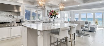 Sunrise Waterfront Retreat: Ocean Views, Luxurious Master Suite, Family-Friendly Beachside Escape