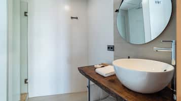 Shower, towels, soap, shampoo