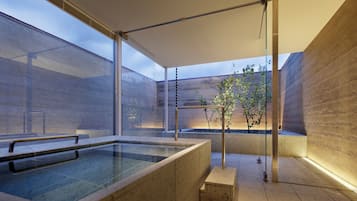 Combined shower/bathtub, deep-soaking bathtub, hair dryer, bathrobes