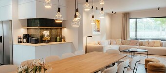 Spacious, sunny luxury vacation home with sauna and garden!