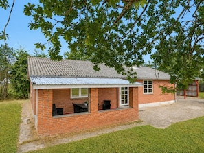 A single-story brick house with a covered patio area. - "Agla" - 2.5km from the sea by Interhome (Nørre Nebel)
