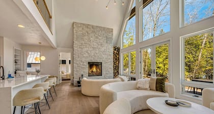 Design-Forward Lakefront Home With Private Shoreline