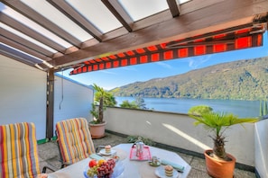 Family Apartment, Multiple Bedrooms, 2 Bathrooms, Lakeside (Miralago Lakeview Morcote With Pool) | Outdoor dining