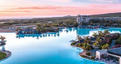 Exquisite 4BR Villa with Breathtaking Views - Golf Cart and Airport Transportation Included!