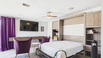 4 bedrooms, desk, iron/ironing board, travel cot