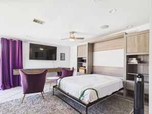 4 bedrooms, desk, iron/ironing board, travel cot