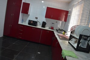 Private kitchen - Nectanik Apartment (Lugbe)