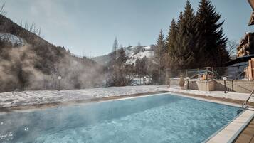 Seasonal outdoor pool, pool umbrellas, pool loungers