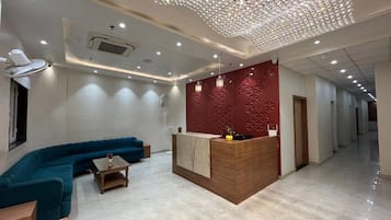 Quarto luxo | Área de estar | TV