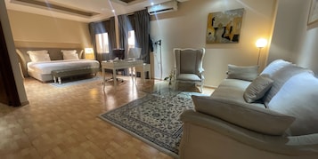 Senior Suite, 1 King Bed, Balcony, City View | 1 bedroom, premium bedding, down comforters, Tempur-Pedic beds