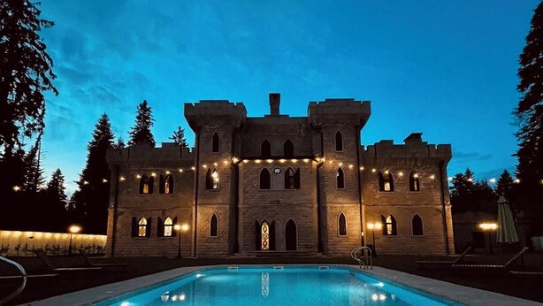 A castle-like building with a swimming pool in front. - The Castle - Your unique way of retreat (Samokov)