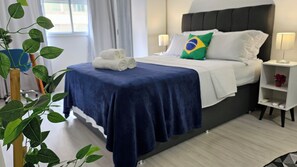 1 bedroom, desk, iron/ironing board, travel crib
