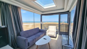 Signature stacaravan, uitzicht op zee | Woonruimte