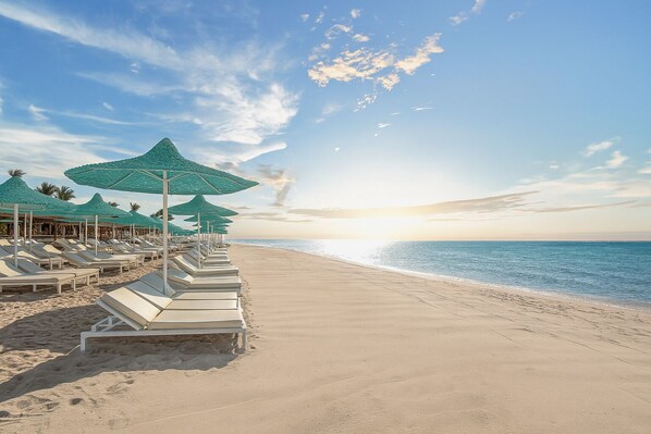 Private beach nearby, free beach shuttle, sun loungers, beach umbrellas