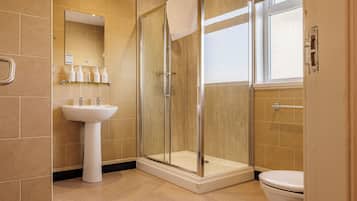 Shower, hair dryer, towels, soap