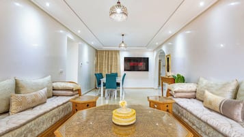 Premium Apartment | Living area | 52-inch LCD TV with satellite channels, TV, Netflix