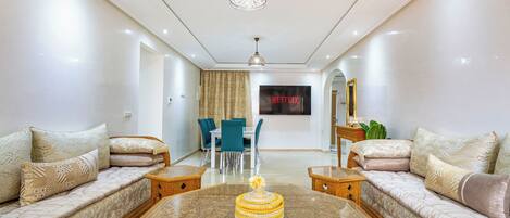 Premium Apartment | Living area | 52-inch LCD TV with satellite channels, TV, Netflix