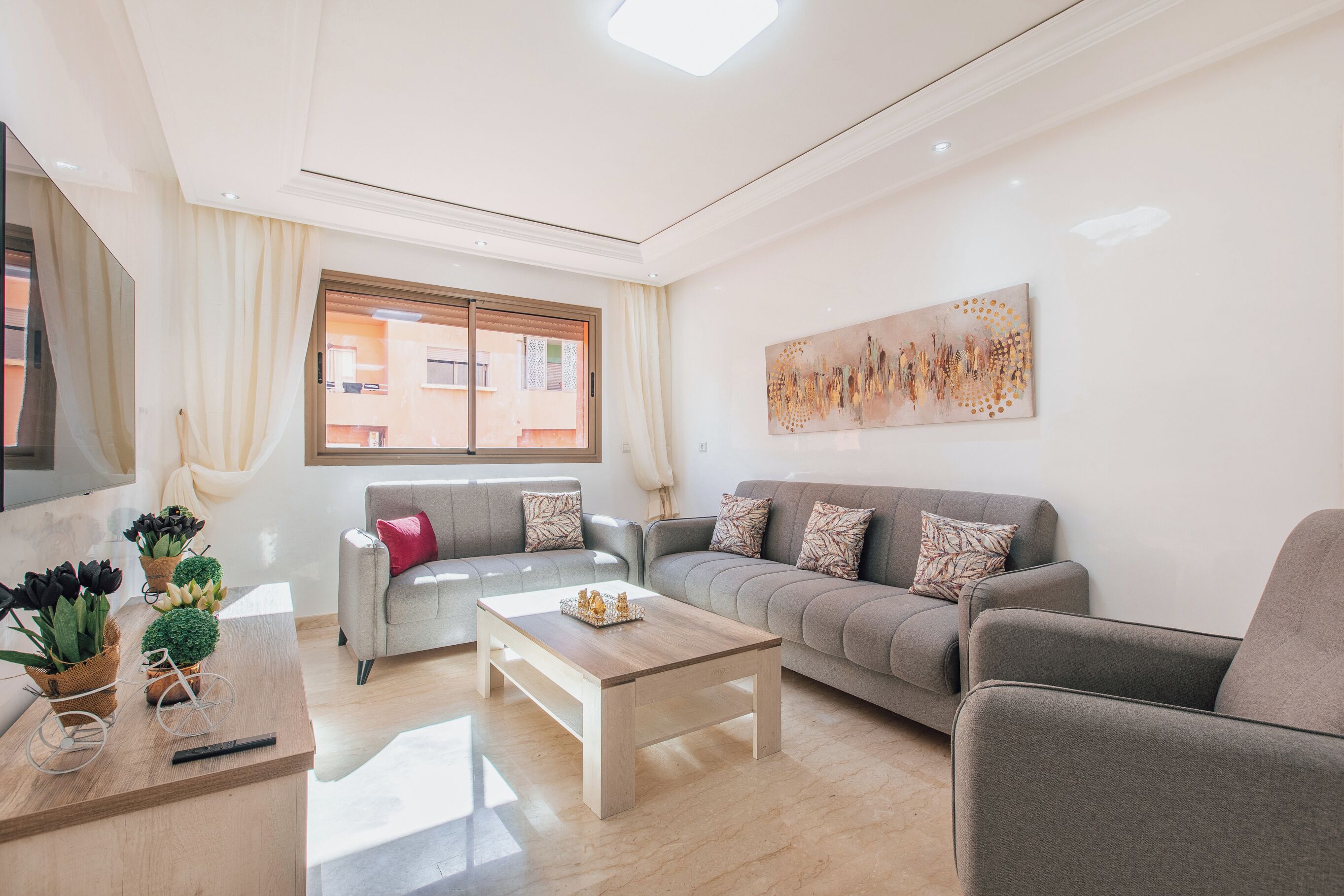 Apartament Deluxe | Sala d'estar | Televisor LCD de 52 polzades amb canals per satèl·lit i televisor 