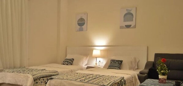 1 habitación, tabla de planchar con plancha, wifi y ropa de cama 