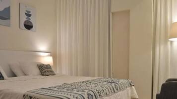 1 chambre, fer et planche à repasser, Wi-Fi, literie fournie