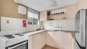 Microwave, dishwasher, dining tables