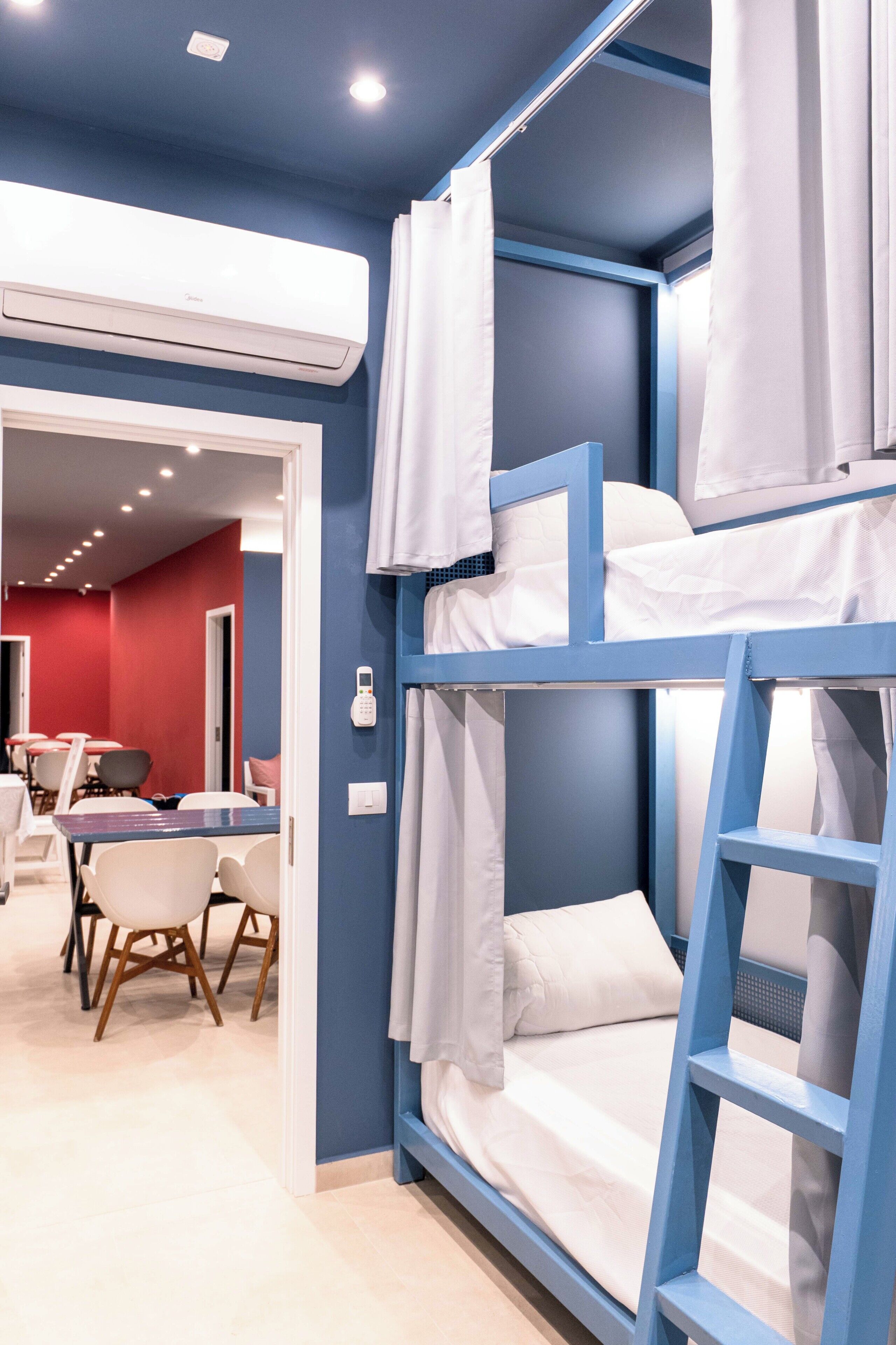 Bed in 8-Bed Dormitory Room Women only | Free WiFi, bed sheets