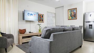 Apartamento | Área de estar | TV