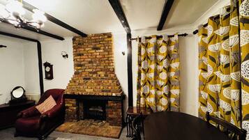 Family House, Garden View | Living area | Flat-screen TV