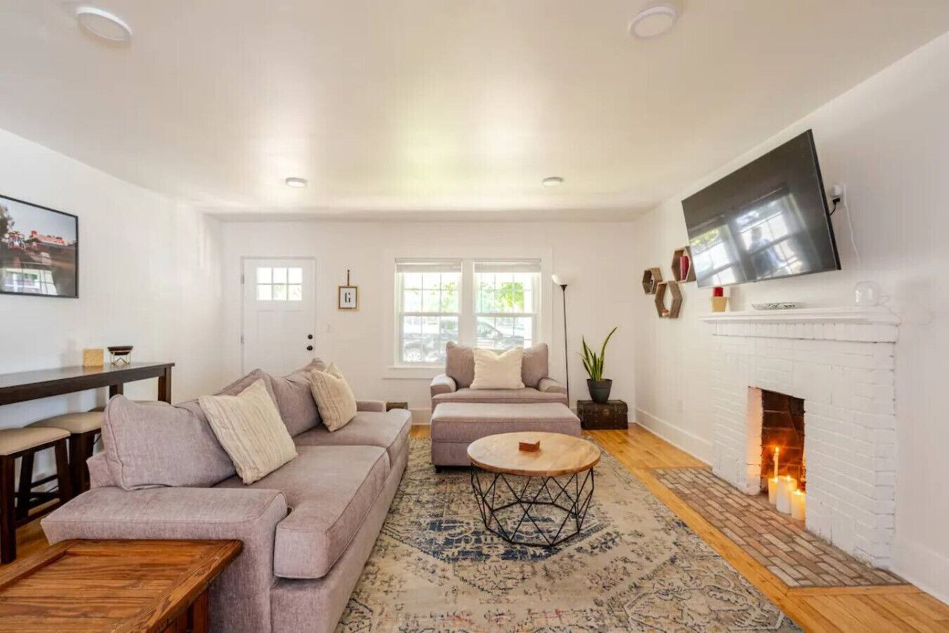 TV, fireplace, books