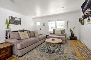 TV, fireplace, books - Downtown Greenway Getaway (Raleigh)