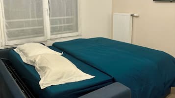1 bedroom, desk, iron/ironing board, travel crib
