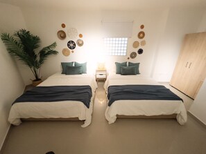 2 habitaciones, tabla de planchar con plancha, wifi y ropa de cama 