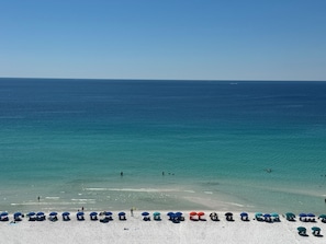 On the beach, sun loungers, beach towels