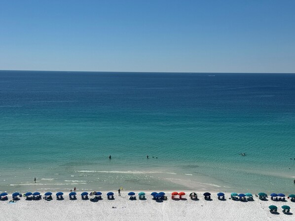 On the beach, sun-loungers, beach towels