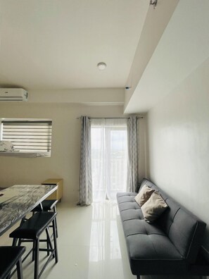 TV - WV Towers Studio with Balcony and Pool (Iloilo City)