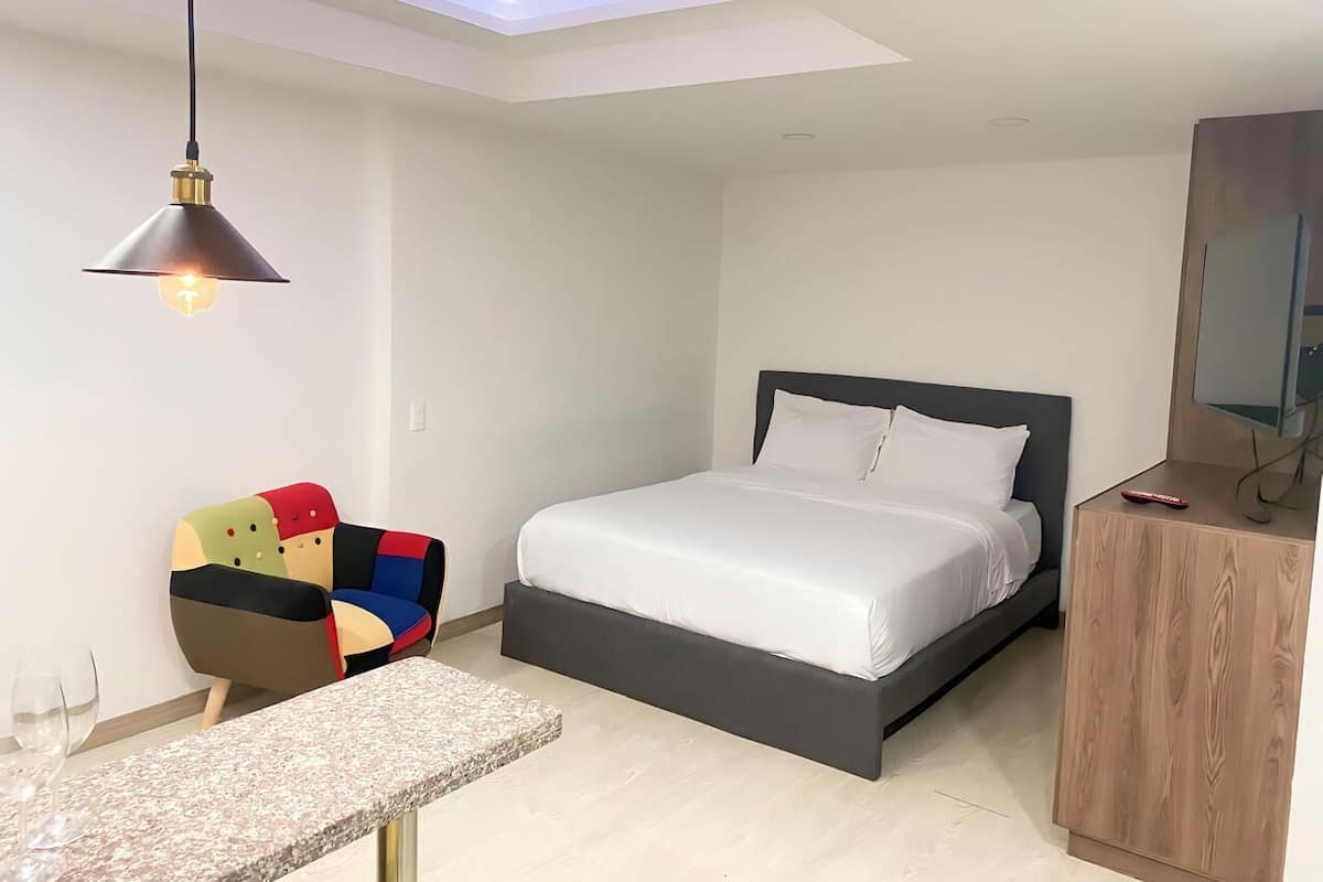 1 bedroom, laptop workspace, blackout curtains, soundproofing