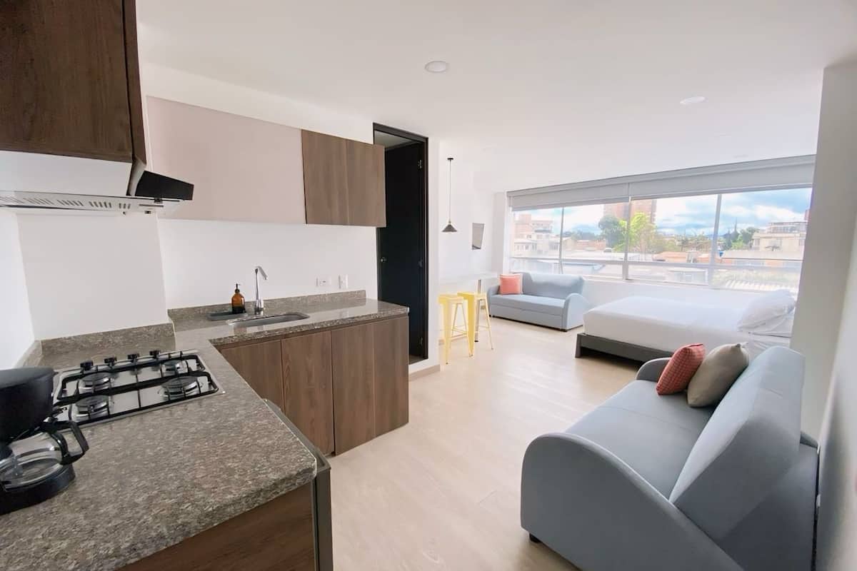 1 bedroom, laptop workspace, blackout curtains, soundproofing