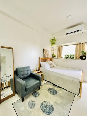 Fer et planche à repasser, draps fournis