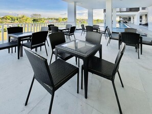 Outdoor dining - Cozy Studio with Balcony at WV Towers (Iloilo City)
