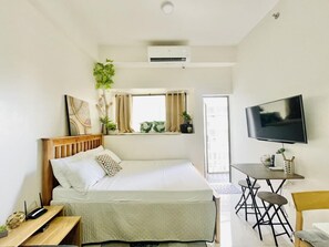 Fer et planche à repasser, draps fournis