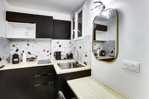 Fridge, microwave, coffee/tea maker, dining tables