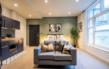 Deluxe Studio Suite, City View | Laptop workspace, iron/ironing board, free WiFi, bed sheets