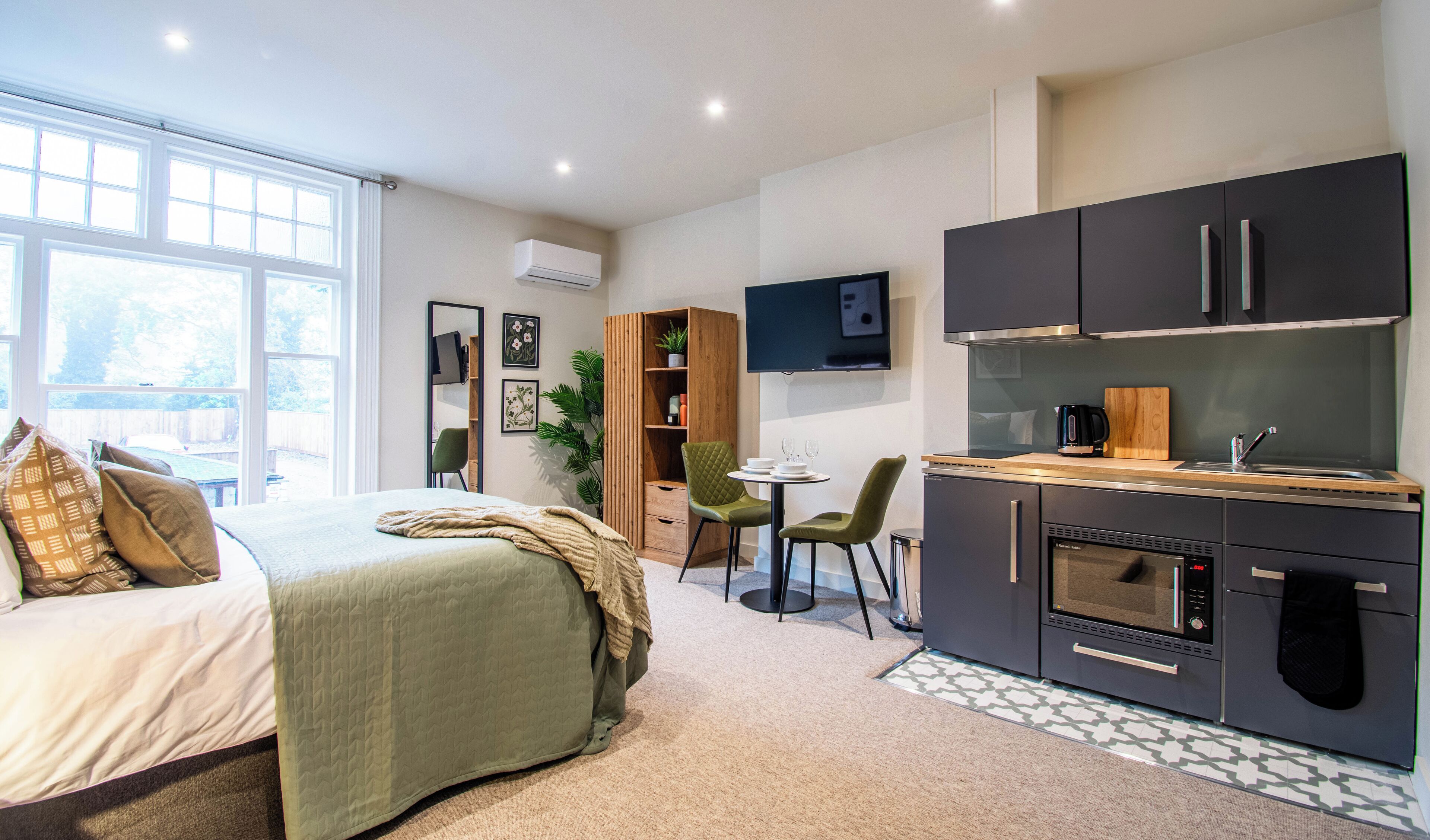 Deluxe Studio Suite, City View | Laptop workspace, iron/ironing board, free WiFi, bed sheets
