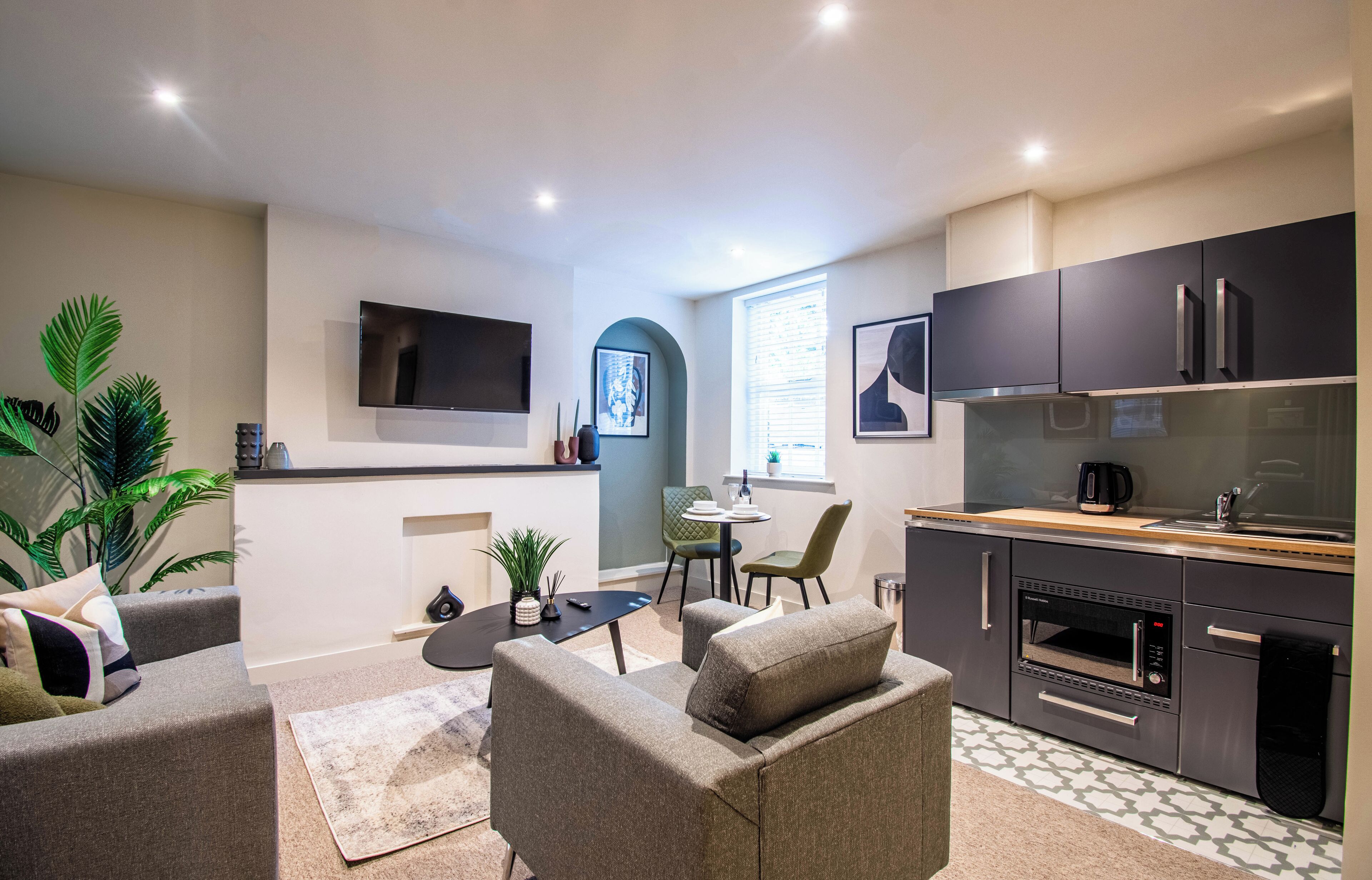 Deluxe Studio Suite, City View | Laptop workspace, iron/ironing board, free WiFi, bed sheets