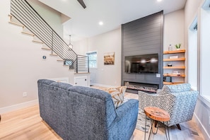 Smart TV, fireplace, books