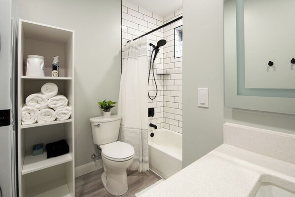 Hair dryer, towels, soap, shampoo