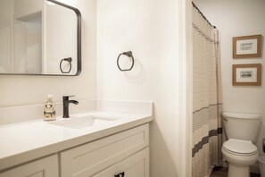 Hair dryer, towels, soap, shampoo