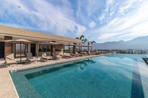 Pool - Modern Corner Condo in Versalles • Rooftop Infinity Pool  • Prime Foodie Location (Puerto Vallarta)