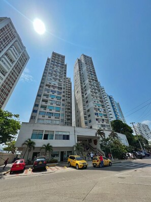 Stunning high-rise building with a prominent entrance and modern design.